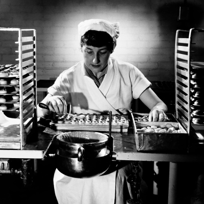 woman making sweets in factory